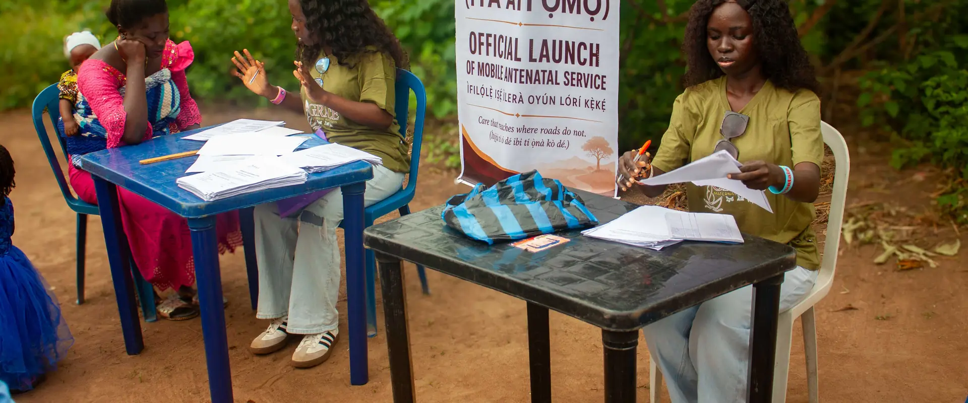 The registration table at the Ikogbo outreach, with the launch banner beside it.